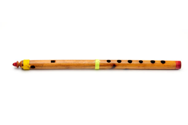 Bamboo wind instrument indian flute on isolated white background