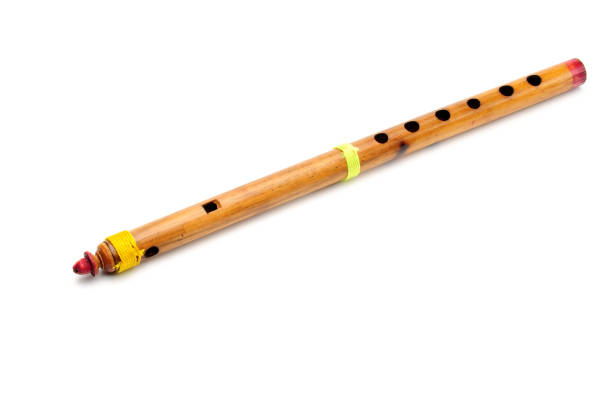 istock Bamboo wind instrument indian flute on white background 1188761690