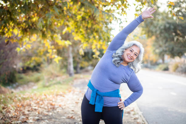 istock Mexican Woman Stretching Back 1188761911