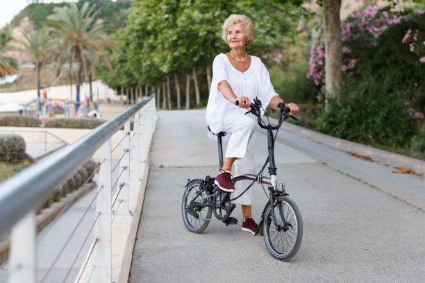 istock Elderly woman going to biking 1188764299