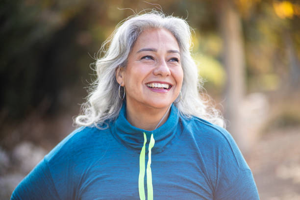 confident mexican woman after workout - senior women cheerful overweight smiling imagens e fotografias de stock