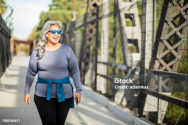 Mexican Woman Walking Stock Photo - Download Image Now - Walking, People, Exercising