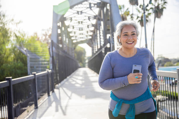 Mexican Woman Jogging on a Trail