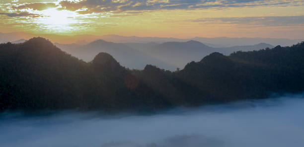 istock mountains under the mist in the morning 1188772989