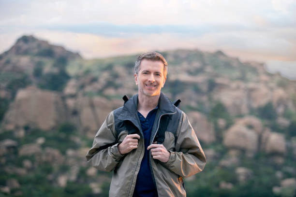 istock Man on Vacation Doing Outdoor Activities on Nature Getaway 1188774012