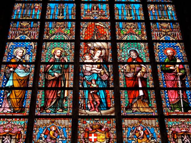 Colorful art in a church Stained glass Ghent church Belgium religious saint stock pictures, royalty-free photos & images