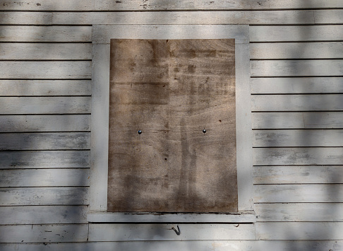 Abandoned - Boarded Window of Vacant Home