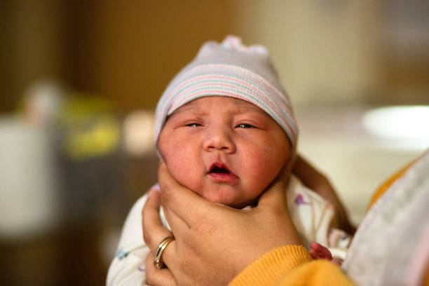 istock Day old Newborn Hispanic baby 1188784210
