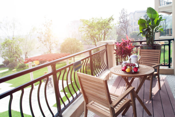 istock Modern garden house table and chairs on the balcony under the sun 1188784363