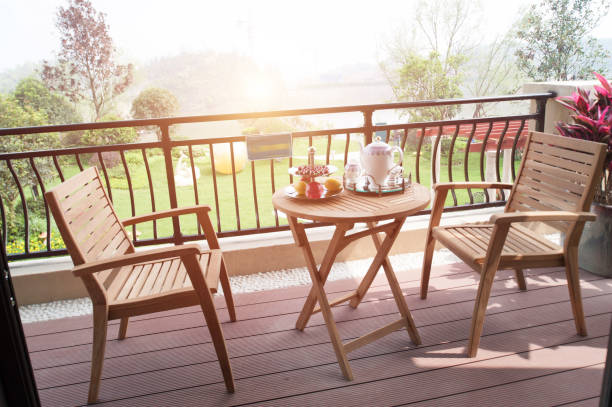 istock Modern garden house table and chairs on the balcony under the sun 1188784370