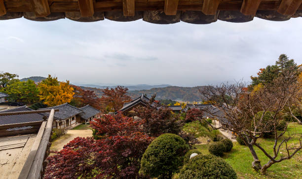 istock A landscape view of a mountain temple covered with maple trees. 1188785316