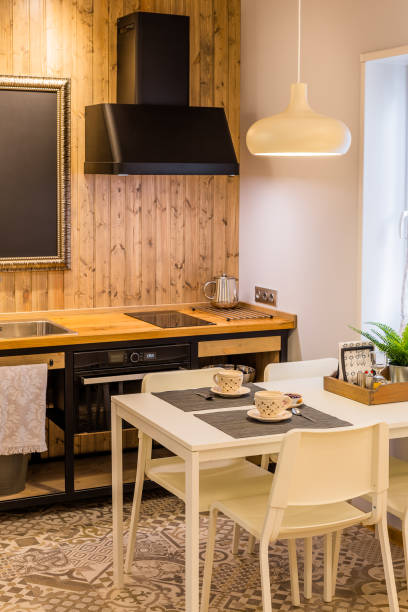istock Modern interior of a kitchen zone in a cozy house 1188787167