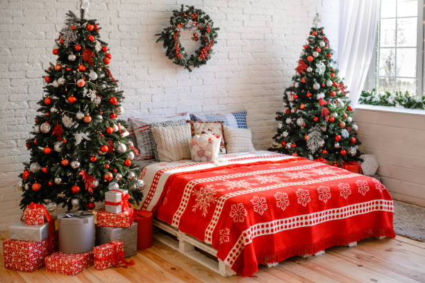 istock Beautiful holdiay decorated room with Christmas tree with presents under it 1188796422
