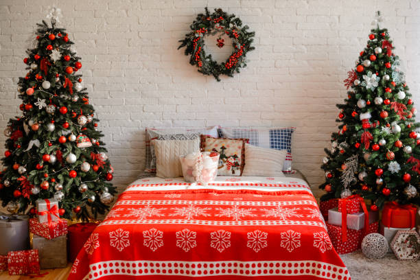 istock Beautiful holdiay decorated room with Christmas tree with presents under it 1188796424