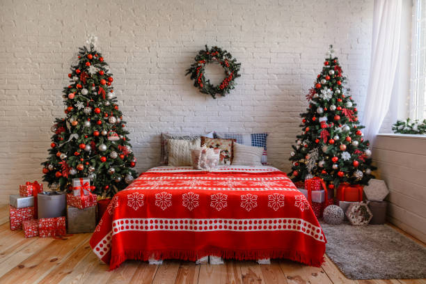 istock Beautiful holdiay decorated room with Christmas tree with presents under it 1188796498
