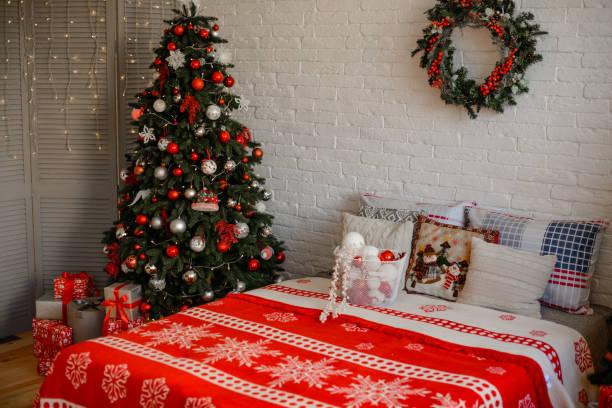 istock Beautiful holdiay decorated room with Christmas tree with presents under it 1188796503