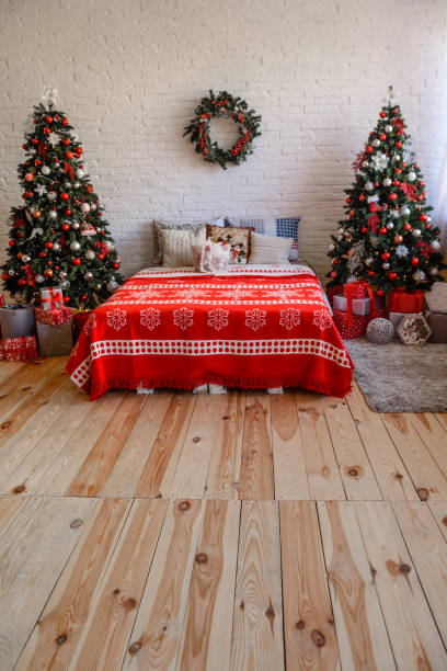 istock Beautiful holdiay decorated room with Christmas tree with presents under it 1188796512
