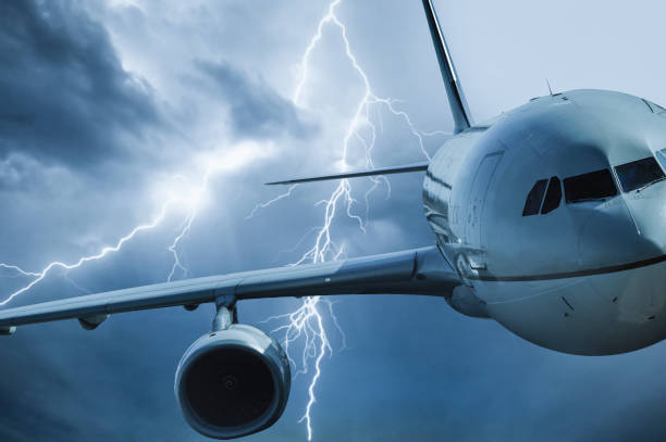 Jet travelling through stormy sky Jet travelling through stormy sky airplane crash stock pictures, royalty-free photos & images
