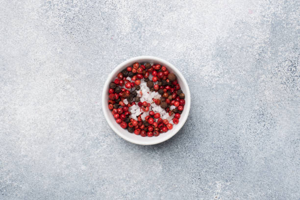 istock spices pepper salt in plates on a gray concrete table with copy space. 1188802838