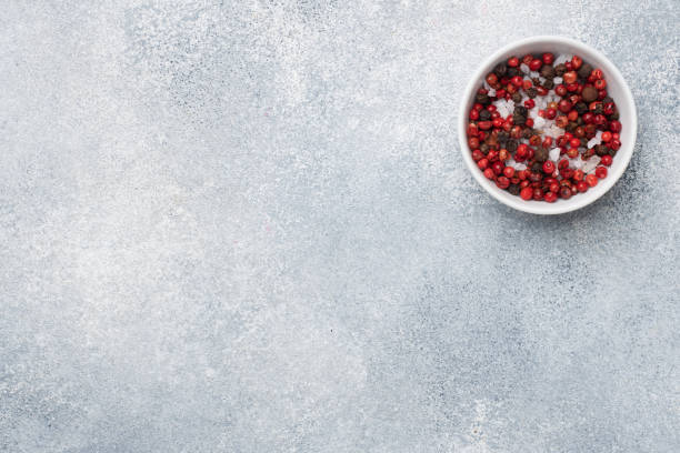 istock spices pepper salt in plates on a gray concrete table with copy space. 1188803480