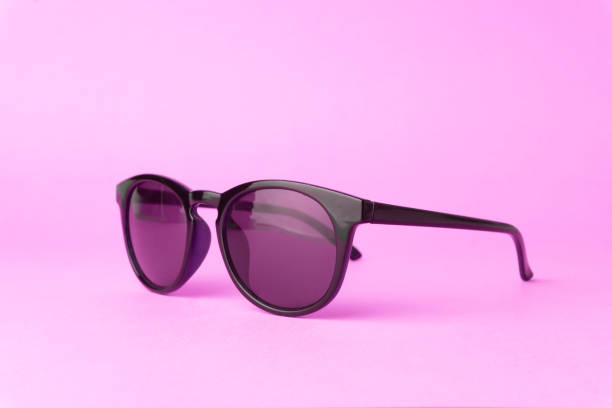 istock Pink vintage sunglasses on a pure pink background 1188803704