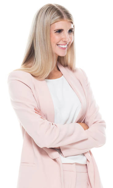 side view / profile view / one person / waist up / portrait of 20-29 years old adult beautiful blond hair / long hair caucasian female / young women businesswoman / business person standing wearing businesswear / business casual / smart casual - 20 25 years profile female young adult imagens e fotografias de stock