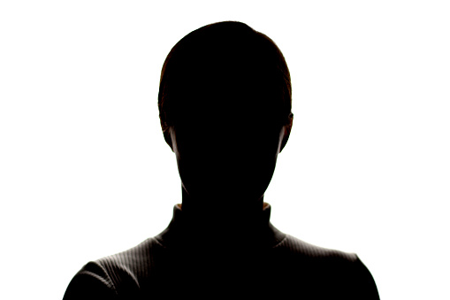 Dark silhouette of a young girl on a white background, front view, the concept of anonymity