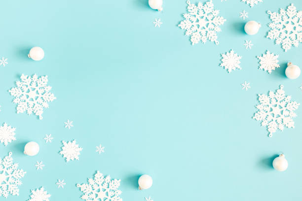istock Christmas or winter composition. Pattern made of snowflakes on pastel blue background. Christmas, winter, new year concept. Flat lay, top view, copy space 1188805755