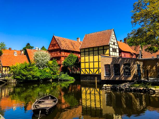Beautiful houses by a river in Aarhus, Denmark - Den Gamle By Beautiful houses by a river in Aarhus, Denmark - Den Gamle By - Danish architecture - Scandinavian denmark stock pictures, royalty-free photos & images