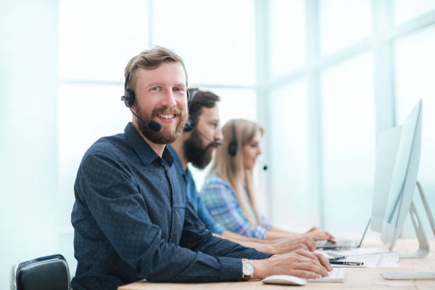istock close up. smiling call center consultant in the workplace 1188814794
