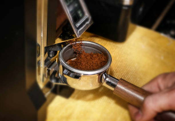 istock Macro shot grinding coffee on professional grinder machine 1188814919