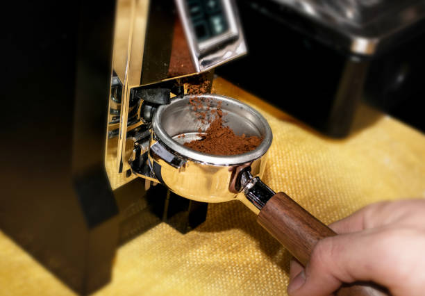 istock Macro shot grinding coffee on professional grinder machine 1188814929