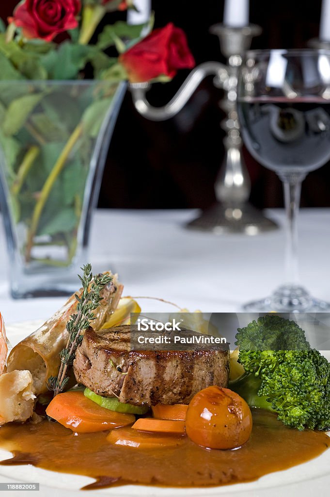 Surf 'n' turf a la carte meal  Candle Stock Photo
