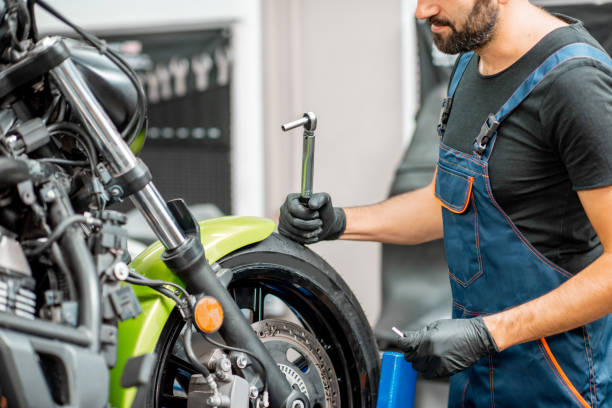 istock Mechanic repairing a motorcycle 1188820567