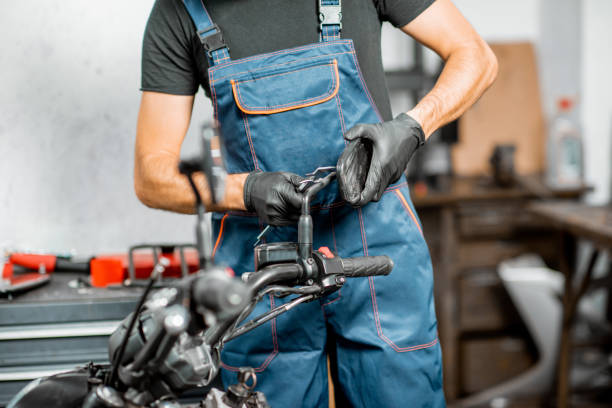 istock Mechanic repairing or tuning motorcycle 1188821999
