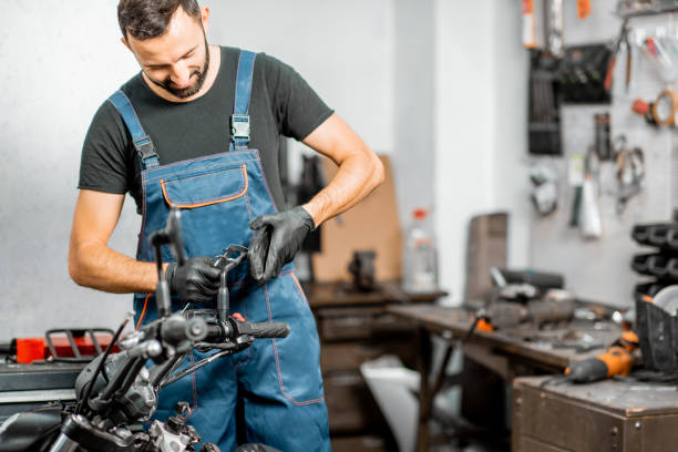 istock Mechanic repairing or tuning motorcycle 1188822043