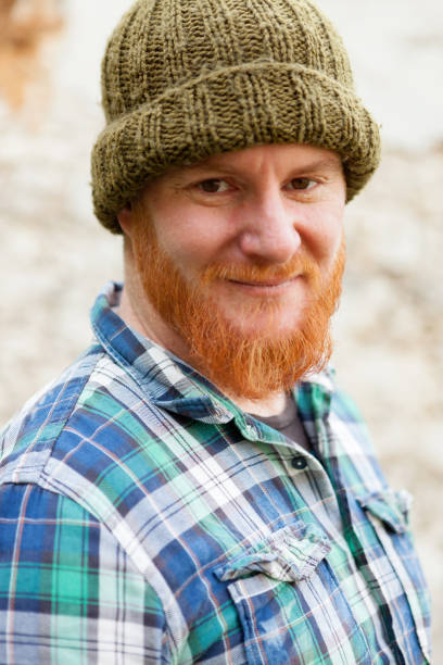 istock Red haired man with blue plaid shirt 1188822184