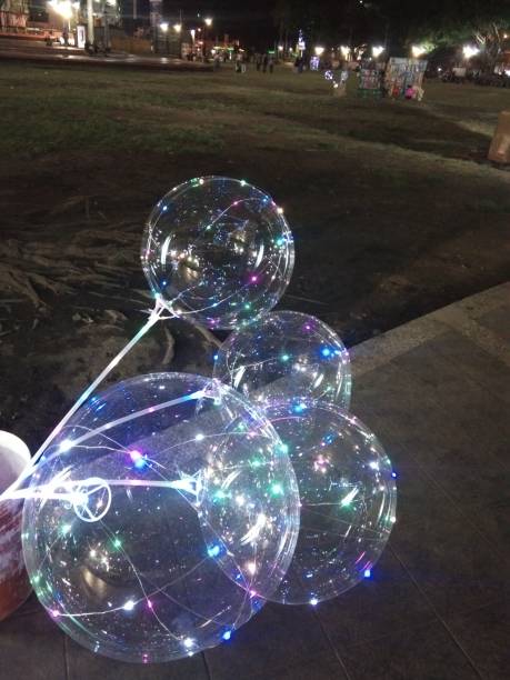 istock Transparent colored balloons with decorative lights inside 1188825022