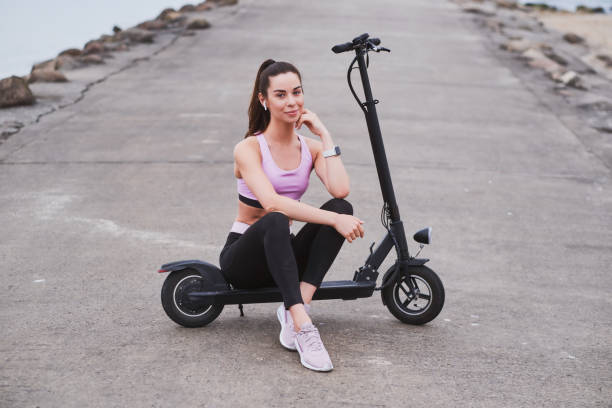 istock Attractive girl is chilling with her scooter 1188837746