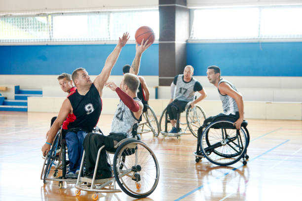 istock Man Blocking Pass in Wheelchair Basketball Competition 1188842045