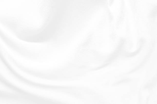 istock White cloth background abstract. Fabric is wrinkled and sofe wave. Material are used in textile assembly. 1188844115