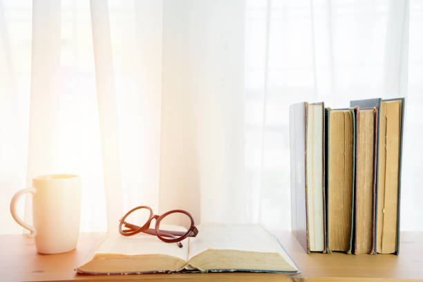 istock Books placed on the table by the window. 1188845105