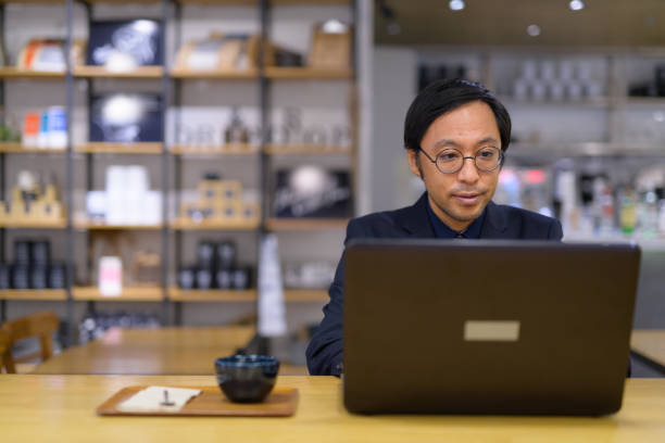 istock Asian businessman working inside the coffee shop 1188845153