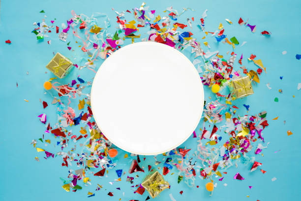 Celebrate success concept. A white circular dish placed in the middle.