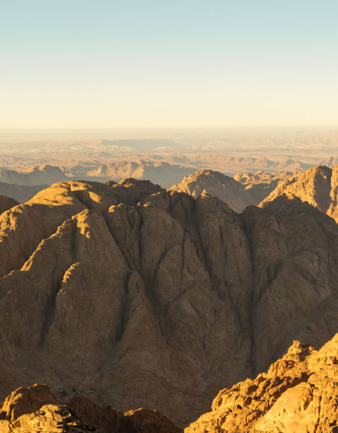 istock Beautiful view from the mountain. Panorama. Mountain range with visible silhouettes through the morning blue fog 1188848695