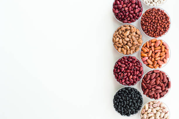 istock Different seed beans in round plates are arranged in a row. 1188848999