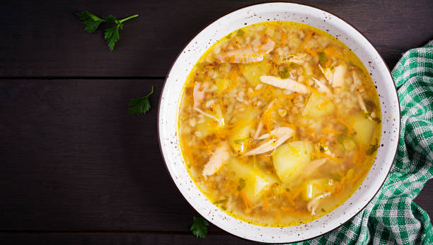 istock Chicken soup with potatoes and buckwheat. Top view 1188849345