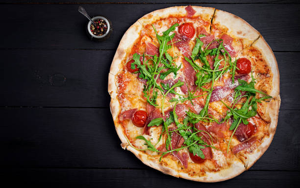 istock Italian pizza. Prosciutto di parma. Top view, overhead 1188849349