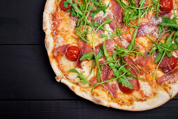 istock Italian pizza. Prosciutto di parma. Top view, overhead 1188849350