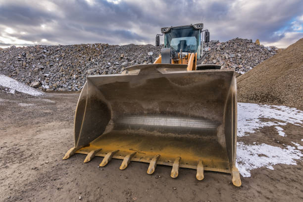 istock Excavator moving gravel and stone in a quarry 1188850400